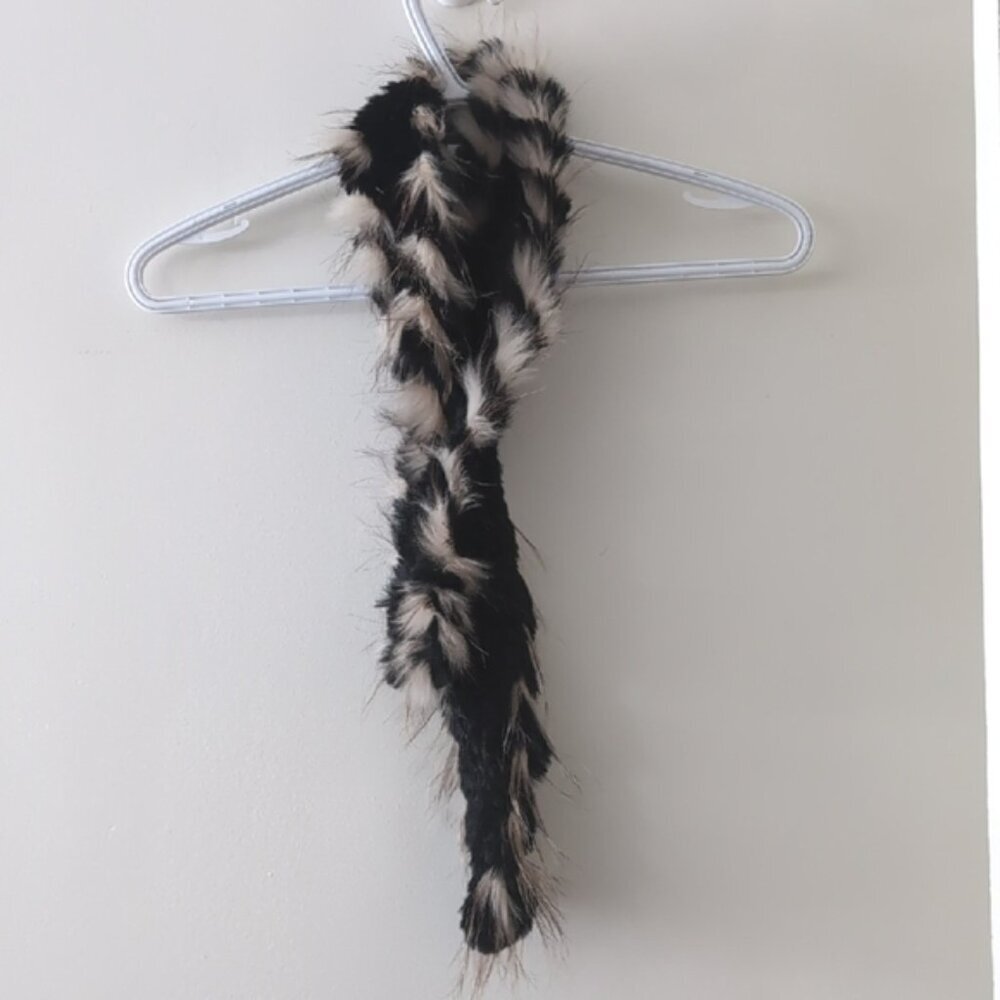 Dino Gaspari rabbit with racoons fur scarf